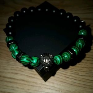 Bear wristband, green and black rocks.